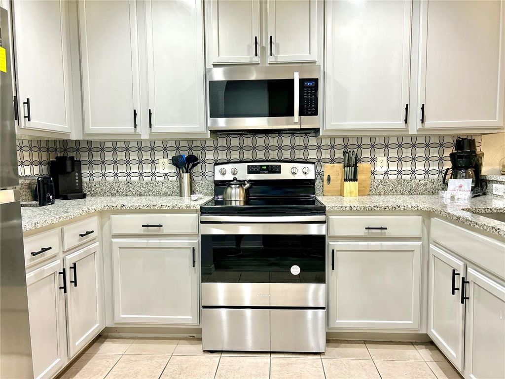 Photo of 9055 Treasure Trove Lane #105, Kissimmee, FL 34747 (MLS # O6404769)