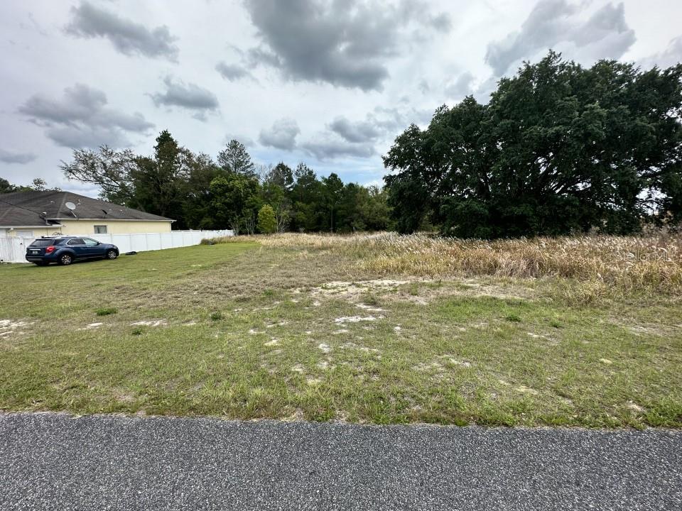 Owner financing available! Pay in installments for as low as $487 a month with only $1,400 down! Pay in full for a discount at $28,000 This lot is located in the growing community of “The Shores.” This .23 acres has already been cleared years ago and is ready to build your dream homes There are many nice new homes in the neighborhood. Very close to Greenway Park, Lake Weir, World Equestrian Center, shopping, schools, hospitals, mall, and restaurants.