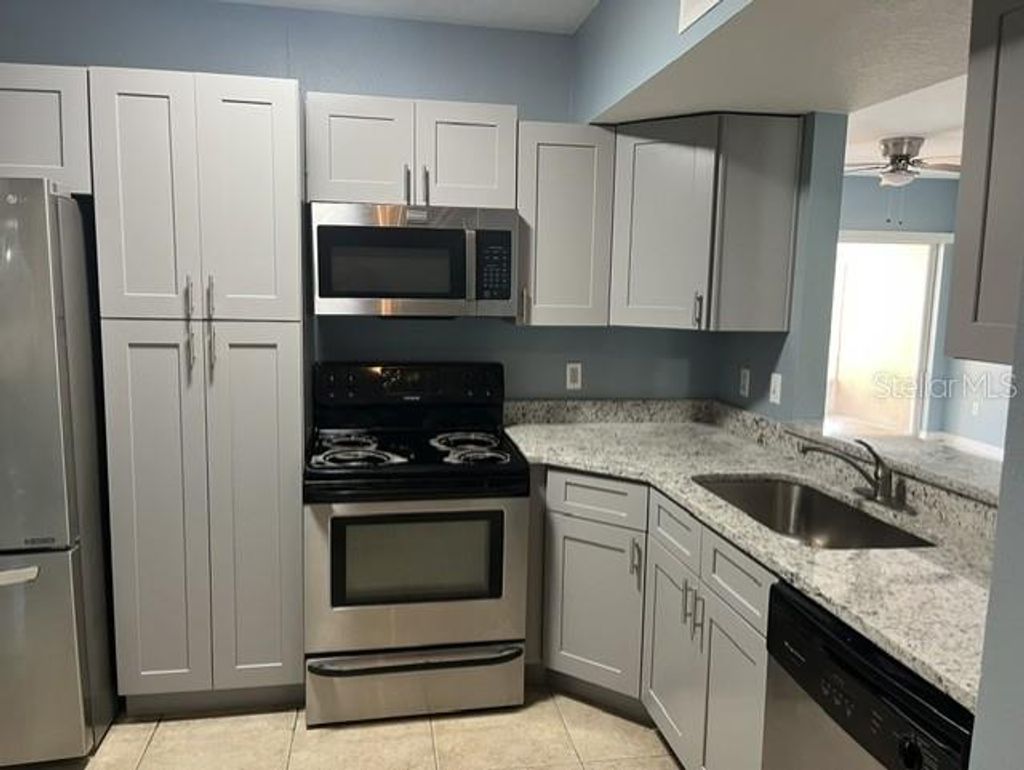 Photo of 495 Las Cortes Lane #102, Orlando, FL 32824 (MLS # S5151894)