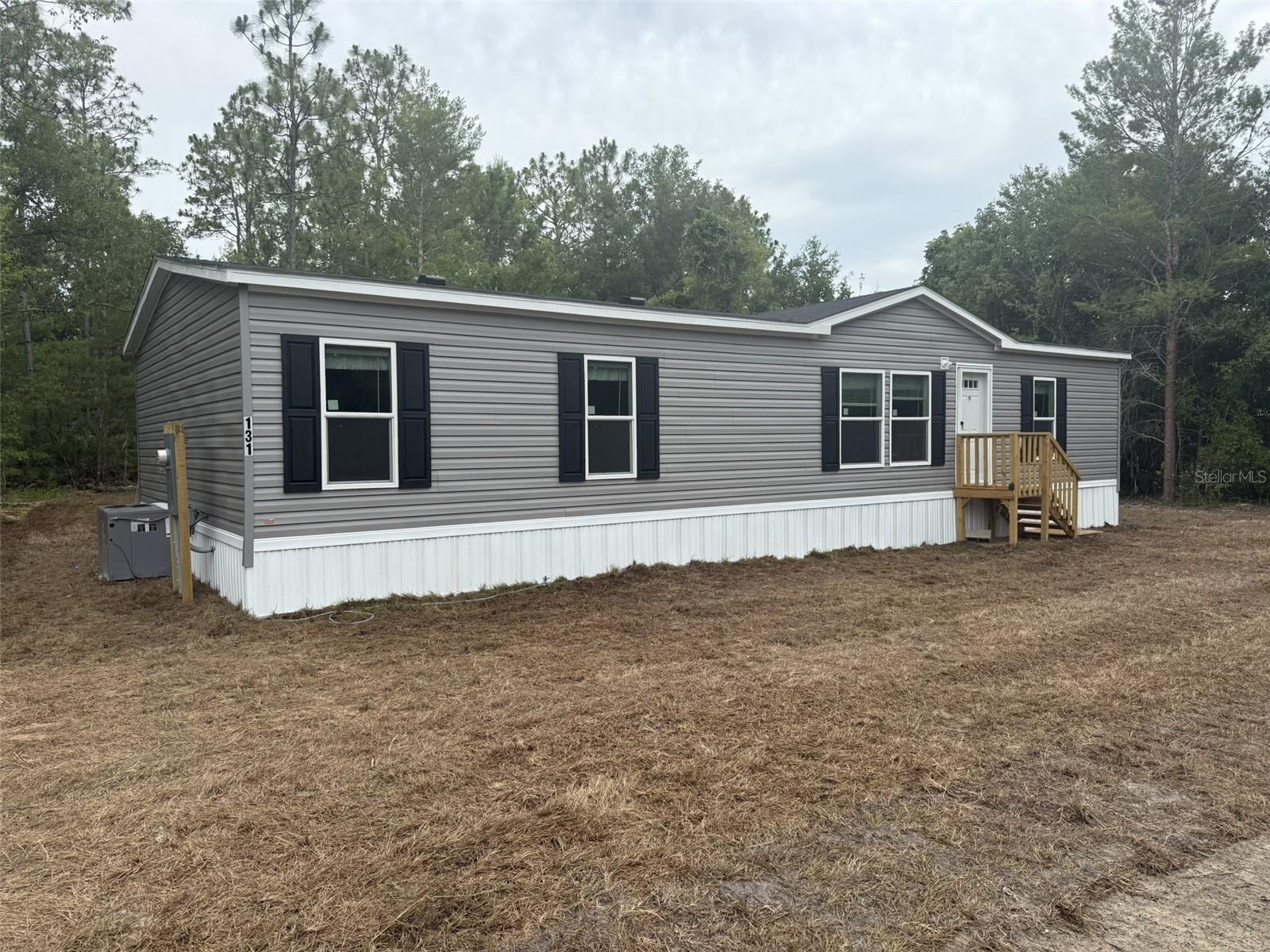 BRAND NEW, never lived in manufacured home. 1 ac lot. New well and septic. Spacious open floor plan. Eat in kitchen with new appliances. Approx 29 minutes Gainsville. Peaceful setting. Added features: alarm system, security cameras, auto sprinkler system. Owner will contribute $5,000 towards buyer's closing costs.
