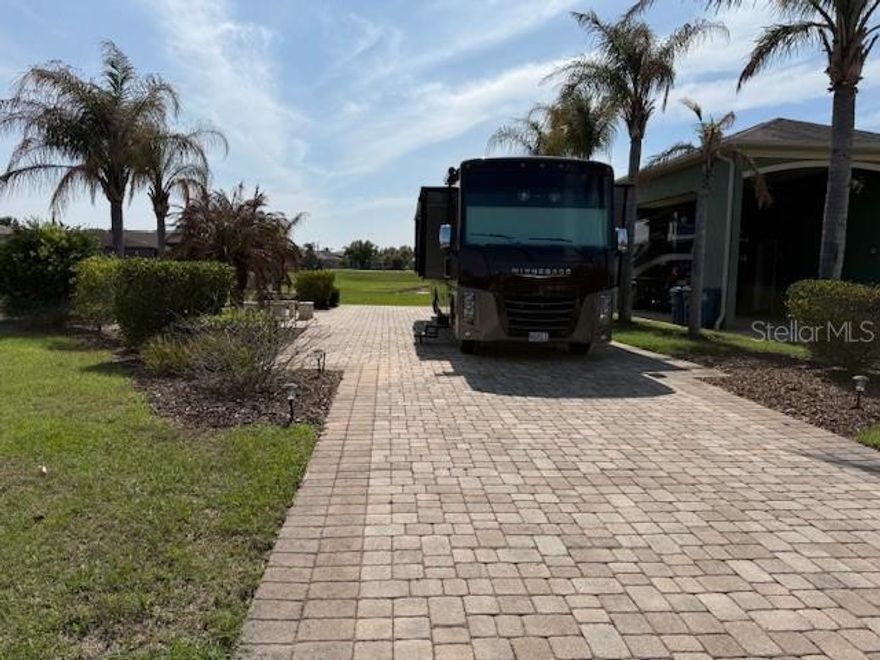 Take a look at this beautiful RV pad in the sought after community of Mt. Olive Shores North.  This pad is perfect for spending the season in comfort on a larger lot with beautiful sunsets every evening.  The property has plenty of room to build a home if you choose.  With its outdoor dining space and beautiful landscaping the days are peaceful.  Enjoy the community and all of the events scheduled by our social committee as you make new friends.
Live in the comfort of your RV in a community of fellow travelers.
Are you ready for your next journey? Call today for an appointment.