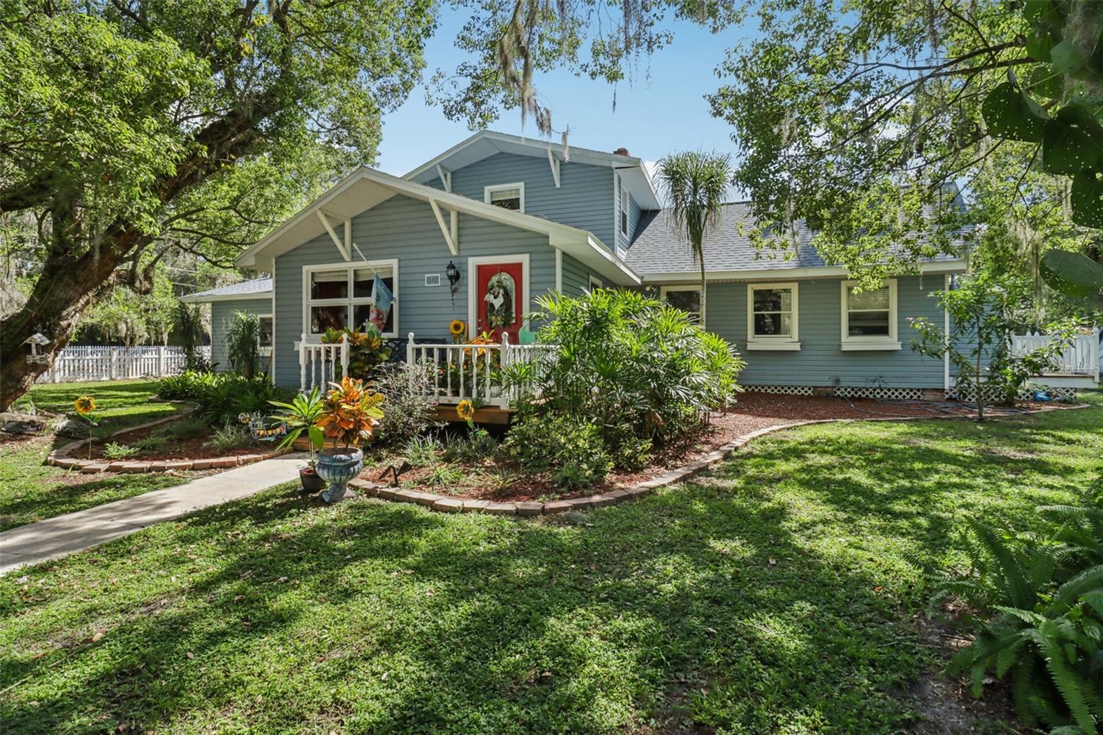 Discover Mount Dora’s 1900 House in the Historic District!
This beautiful 1900 home boasts 2,725-square-feet that is ideally located less than half a mile to Downtown Mount Dora’s Historic District, offering easy access to shops, restaurants, and lakefront amenities. Situated on a spacious half-acre corner lot, this property is zoned R-2, permitting the addition of a second dwelling (subject to relevant permissions), making it an excellent opportunity for a short-term vacation rental or additional living space.
This 125-year-old home is a historic gem with high ceilings, large living spaces, spacious bedrooms, and a scenic yard filled with old Florida oak trees, all while nestled in the middle of Mount Dora’s Golf-Cart-Friendly downtown.
The home features updated plumbing (2011), electrical systems (2011), a new A/C unit (2011), and a recently replaced roof (2025), blending historic character with modern upgrades, including refinished original hardwood floors & updated vinyl flooring. The expansive lot offers ample space for outdoor activities, parking for festivals, or relaxation, shaded by majestic oak trees. With no HOA, you have the flexibility to park an RV, boat, or customize the property to your needs.
Schedule a showing today & do not miss this rare chance to own a part of history in the heart of Mount Dora’s Historic District!