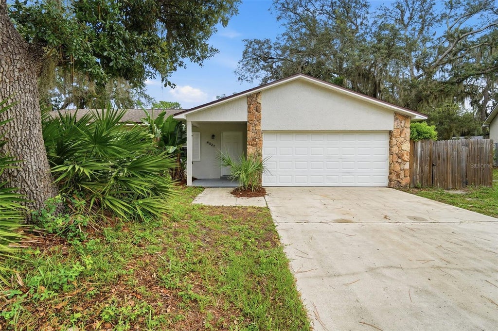 Photo of 4027 Woodsong Drive, Orlando, FL 32817 (MLS # V4950725)