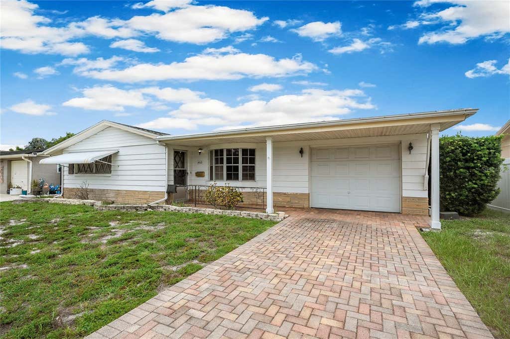 Photo of 3410 Columbus Drive, Holiday, FL 34691 (MLS # TB8537199)
