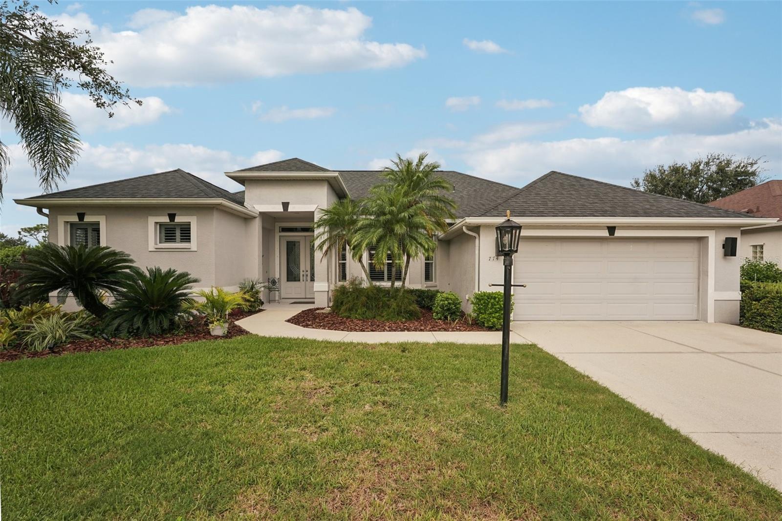 One or more photo(s) has been virtually staged. ***Mortgage savings may be available for buyers of this listing***
Welcome to 774 Planters Manor Way, a custom-built 3-bedroom, 2-bath pool home offering the perfect blend of comfort, elegance, and stunning views. Situated on an oversized corner lot, the property overlooks a peaceful pond on one side and the 9th hole of the Links Golf Course in back, with breathtaking sunsets and refreshing breezes every evening.
Inside, double 8-foot front doors open to spacious living with 10-foot ceilings, black porcelain tile, hardwood floors, and white plantation shutters throughout. The family room includes a natural gas connection for a fireplace, while the kitchen offers maple cabinets with crown molding, a breakfast bar, aquarium window, natural gas range, and bay window in the dining area.
The primary suite is generously sized with two walk-in closets, an additional shoe closet, and a large bath with a double walk-in shower. A second bedroom features built-in shelving with a reading nook, and the third bedroom offers flexibility for guests or an office.
The screened pool and spa area is ideal for entertaining, complete with a 18x25 pool, 8x10 spa, expansive deck and lanai, plus a man cave with built-in cabinets, fridge, and running water. A portable gas grill, washer, and dryer remain with the home.
Additional highlights include central vacuum, security system, hurricane protection, irrigation system, radiant barrier roof insulation, and poly shutters on all windows and doors. Conveniently located near I-75, you’re just 40 minutes to Tampa, 20 minutes to Sarasota, and 30 minutes to the Gulf beaches.
This home offers a rare combination of luxury, practicality, and unforgettable views—ready for you to make it your own.