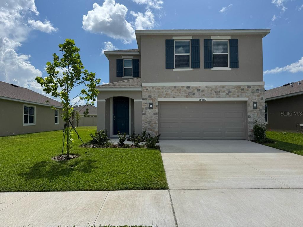 Photo of 10629 Dusty Boot Road, Land O Lakes, FL 34638 (MLS # J991852)