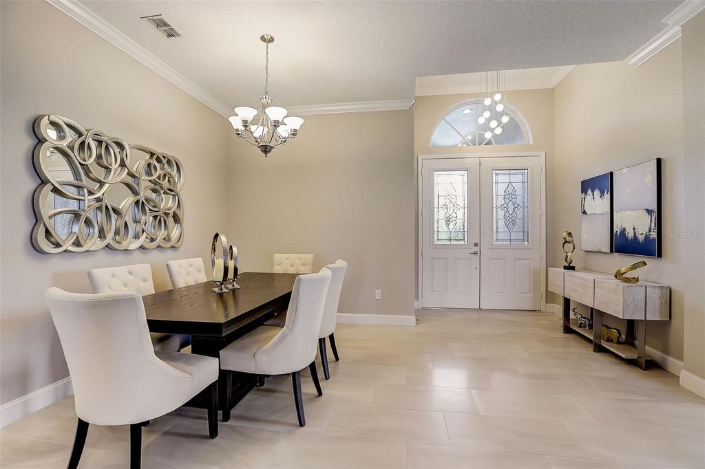 Photo of 23338 Dinhurst Ct, Land O Lakes, FL 34639 (MLS # TB8499070)