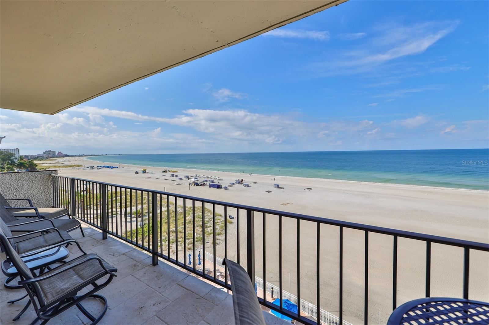 This is a Direct Beach Front Unit - Amazing views from the 6th floor with a full 28 ft balcony directly on the Gulf Of Mexico. Enjoy the sunsets right from your balcony. 3 MONTH MIN. RENTAL! Available starting 09/09/2025. Beautifully decorated 1,300 square foot condo with beach front views in a safe, clean and well-maintained building that sits directly on St. Pete Beach. Just step out the front of the pool area and you are on the most pristine, sandy beaches that you will find anywhere with plenty of water activities. just a short walk on the beach to restaurants, beach bars and the Publix grocery store and other convenient amenities. The property includes a heated pool and deck with plenty of chairs and tables. There is a 54' HD LED TV in living room and 48' LED TV in master w/ DVD Blu Ray. All furniture and beds are top quality, including deluxe dining table with 6 chairs, 6 person sofa, and balcony furniture. Masterfully decorated kitchen with all necessary amenities. Our Non-Smoking condo is located on the 6th floor of an 11-story building and includes magnificent 270-degree views that sweep from the Intra-coastal, to the Don Cesar, to Egmont Key and across the Gulf. All rooms have full Gulf view and balcony! You'll feel right at home with a full kitchen, new refrigerator and dishwasher, free wi-fi internet access, and new closets. Nestled between all the activity of Tradewinds and Sirata Hotels, Seamark captures all the amenities of world class resorts, beach views, resort size pool and deck area right on the beach. The kitchen has been updated to include granite counter tops and stainless-steel appliances. Travertine tile throughout... no carpet anywhere! You will not find a better beach vacation place anywhere else. In 2021, Tripadvisor voted Saint Pete Beach as the number one beach in the United States but was also rated fifth in the world. During peak period, Jan--Mar 2026 rent will be $7,500 per month.
