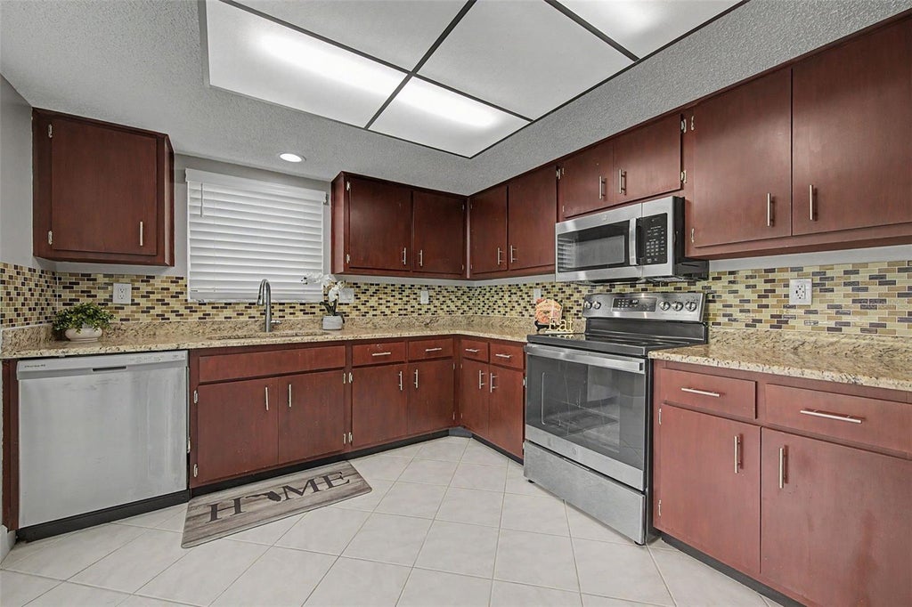 Photo of 7800 Fairlawn Drive, Hudson, FL 34667 (MLS # TB8538031)