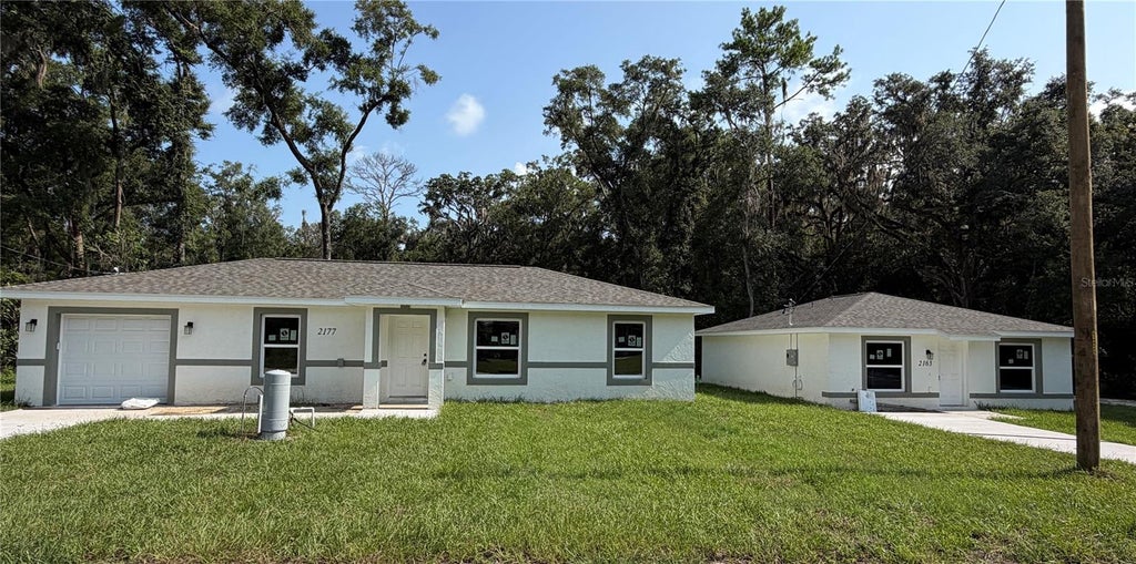Photo of 2163 NW 65th Place, Ocala, FL 34475 (MLS # OM729173)