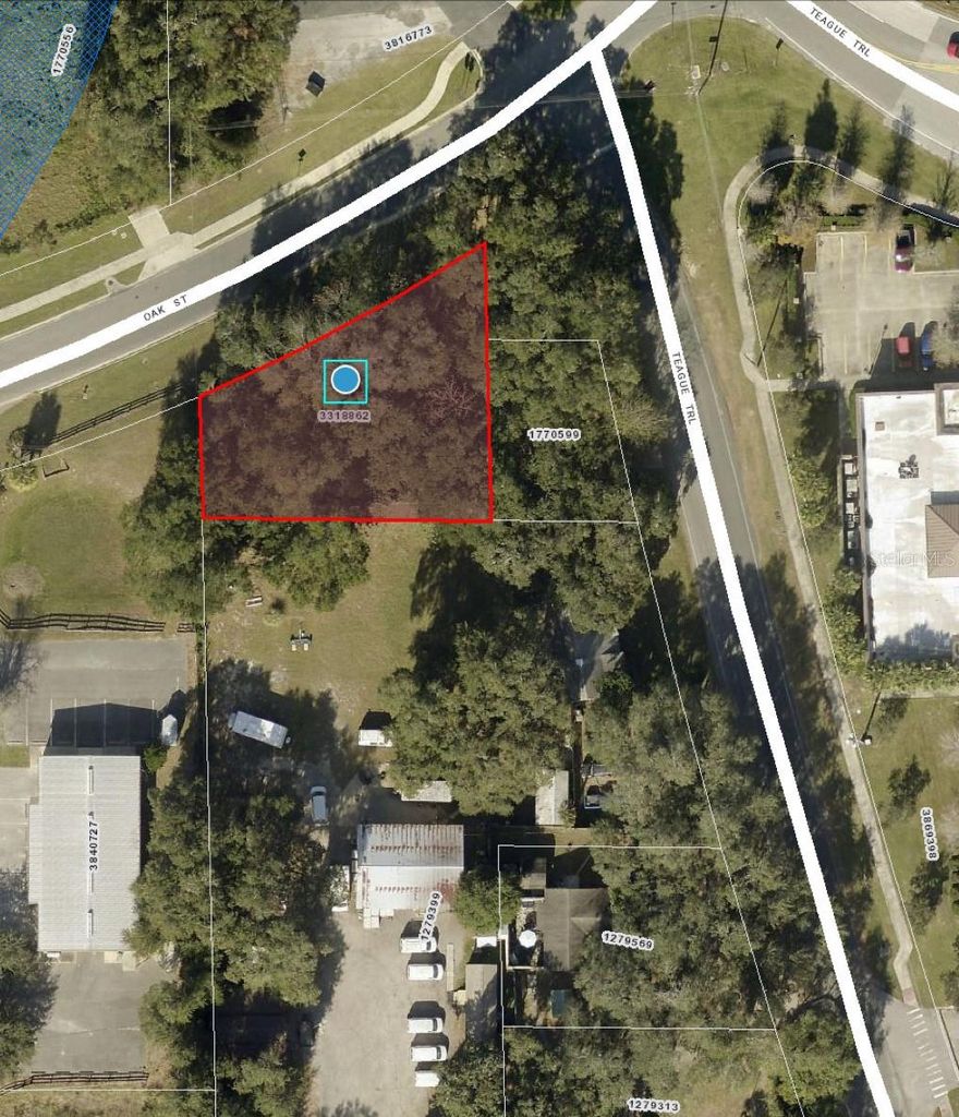 Commercial lot in Lady Lake zoned HC, Heavy Commercial. Fast growing area nearby The Villages, great for office or retail with utilities nearby.
