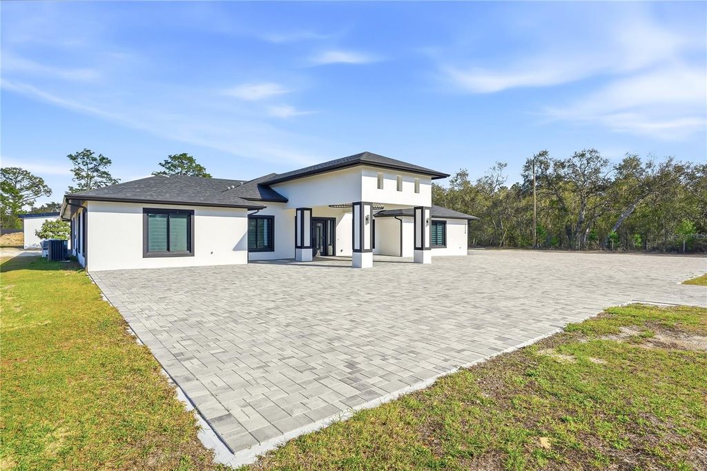 Photo of 17736 Overstreet Lane, Spring Hill, FL 34610 (MLS # TB8479780)