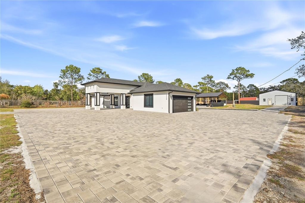Photo of 17736 Overstreet Lane, Spring Hill, FL 34610 (MLS # TB8479780)