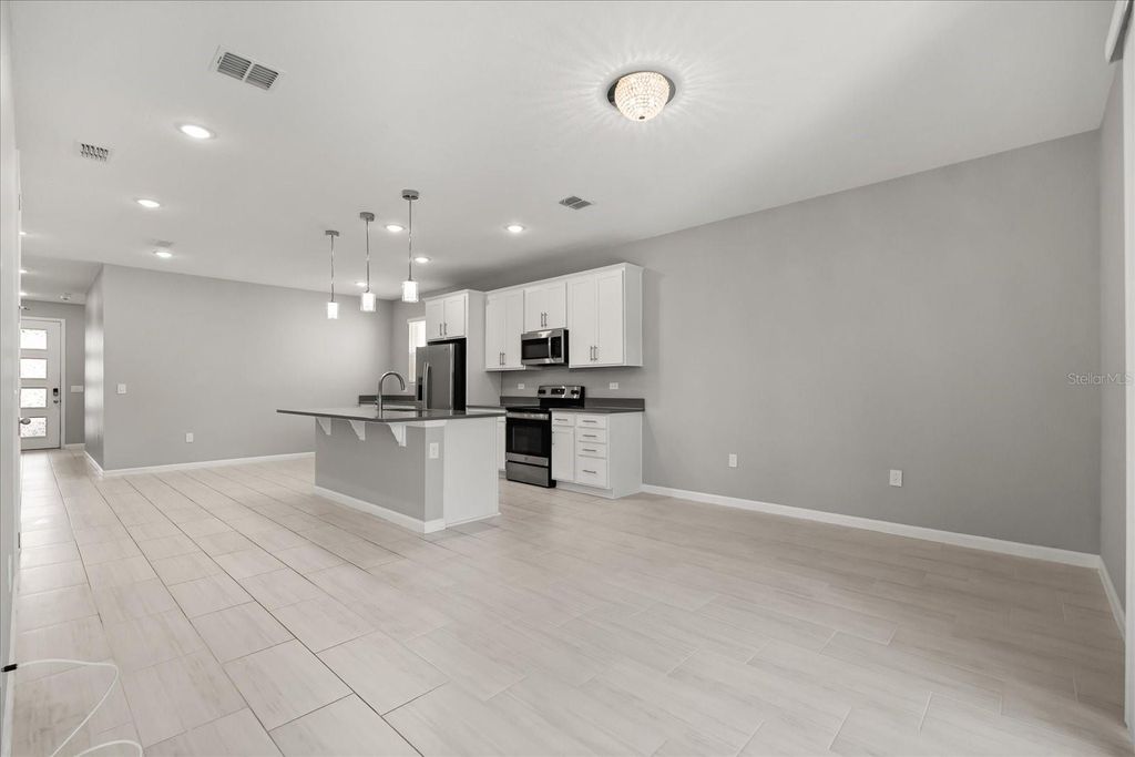 Photo of 1944 Chickasaw Boulevard, Davenport, FL 33837 (MLS # O6361234)