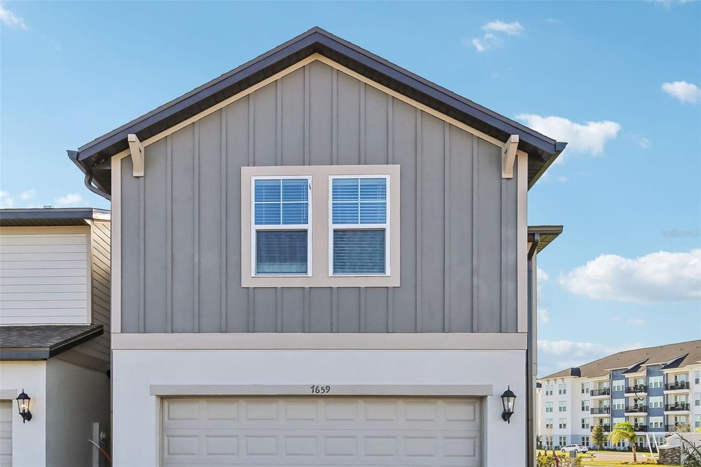 Photo of 7659 Momentum Parkway, Wesley Chapel, FL 33545 (MLS # O6234804)