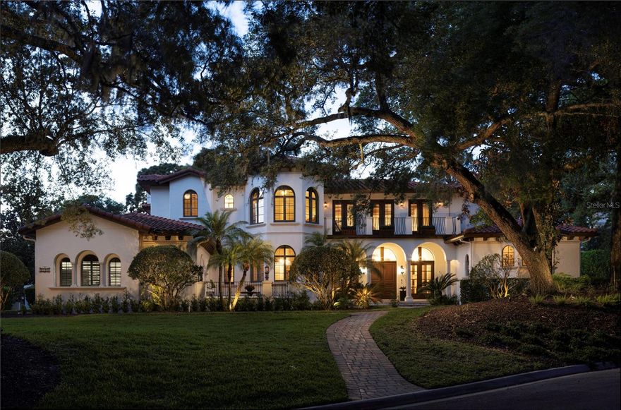 Nestled within the coveted Reserve at Alaqua Lakes, a private enclave of just twenty-five homesites nearest to The Legacy Club and main entrance, 1716 Greystone Court offers over 5,700 square feet of refined living space. This custom Mediterranean estate features five bedrooms, six baths, and stunning views from every angle.