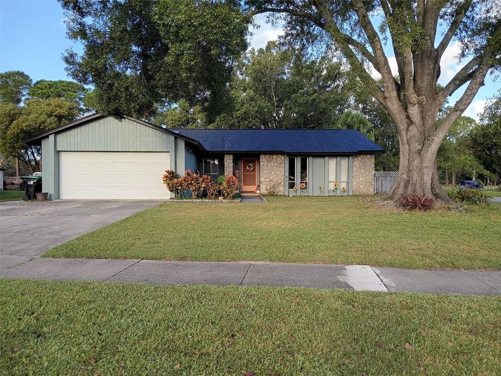 Photo of 10700 Gardenwood Road, Orlando, FL 32837 (MLS # O6352404)