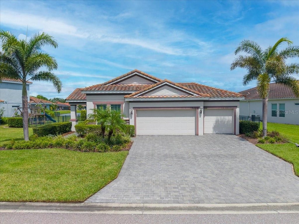 Photo of 13240 Saw Palm Crk Trl, Bradenton, FL 34211 (MLS # TB8547145)
