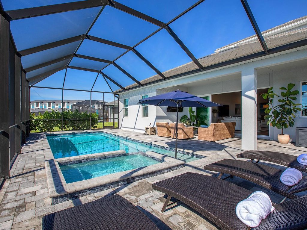 Photo of 10030 Degas Terrace, Bradenton, FL 34212 (MLS # A4676470)