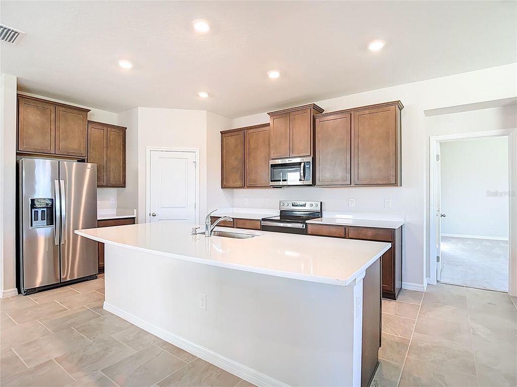 Photo of 10471 Bridgegate Heights Loop, San Antonio, FL 33576 (MLS # TB8445691)