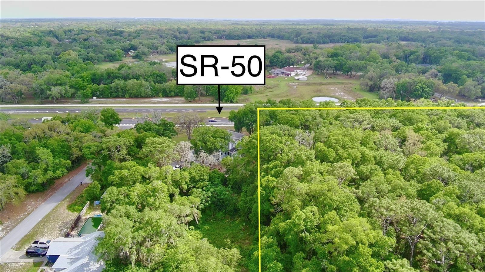 Situated directly on US 50, this 9.5-acre vacant land parcel offers a prime opportunity for multifamily development. With infrastructure in place, this property is ideal for investors and developers looking to capitalize on its convenient location, close to amenities and major transportation routes. Enjoy the best of both worlds with urban accessibility and serene surroundings. This property is 1.5 miles east of I-75, 1 mile from US 98, and 1 mile from US 301.