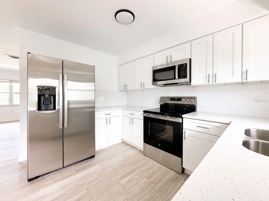 Photo of 11295 1st Street E, Treasure Island, FL 33706 (MLS # TB8432743)