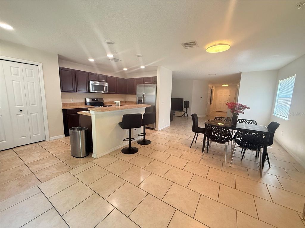 Photo of 307 Prickle Pear Court #64, Orlando, FL 32824 (MLS # S5148686)