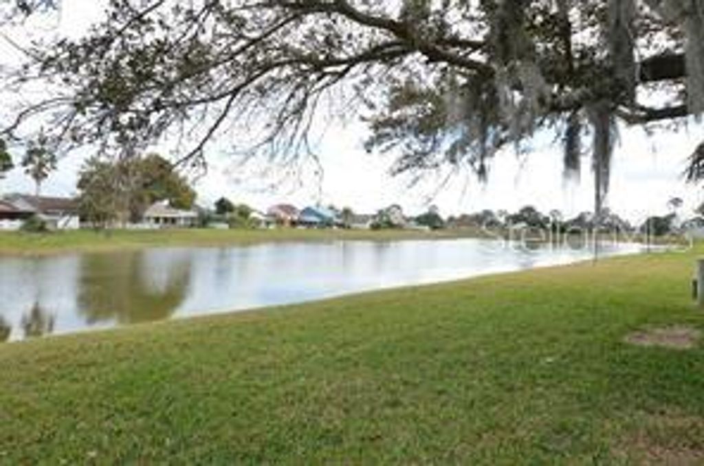 Photo of 72 Lakepointe Circle, Kissimmee, FL 34743 (MLS # O6412111)