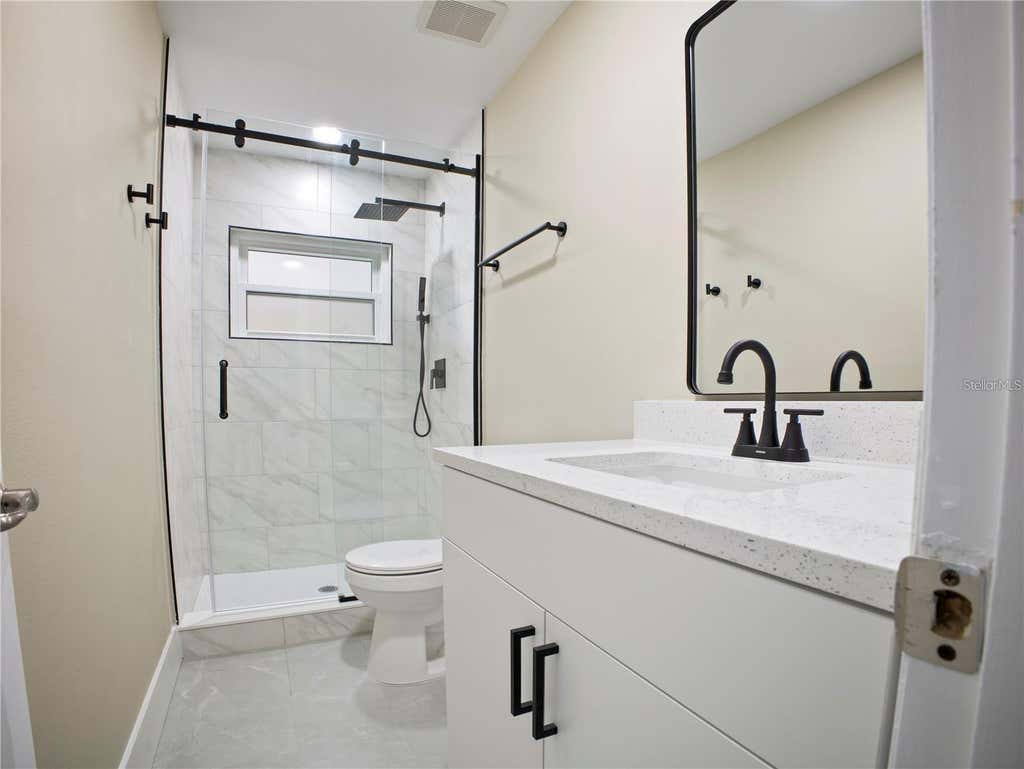 Photo of 196 W Lake Damon Drive, Avon Park, FL 33825 (MLS # O6432070)