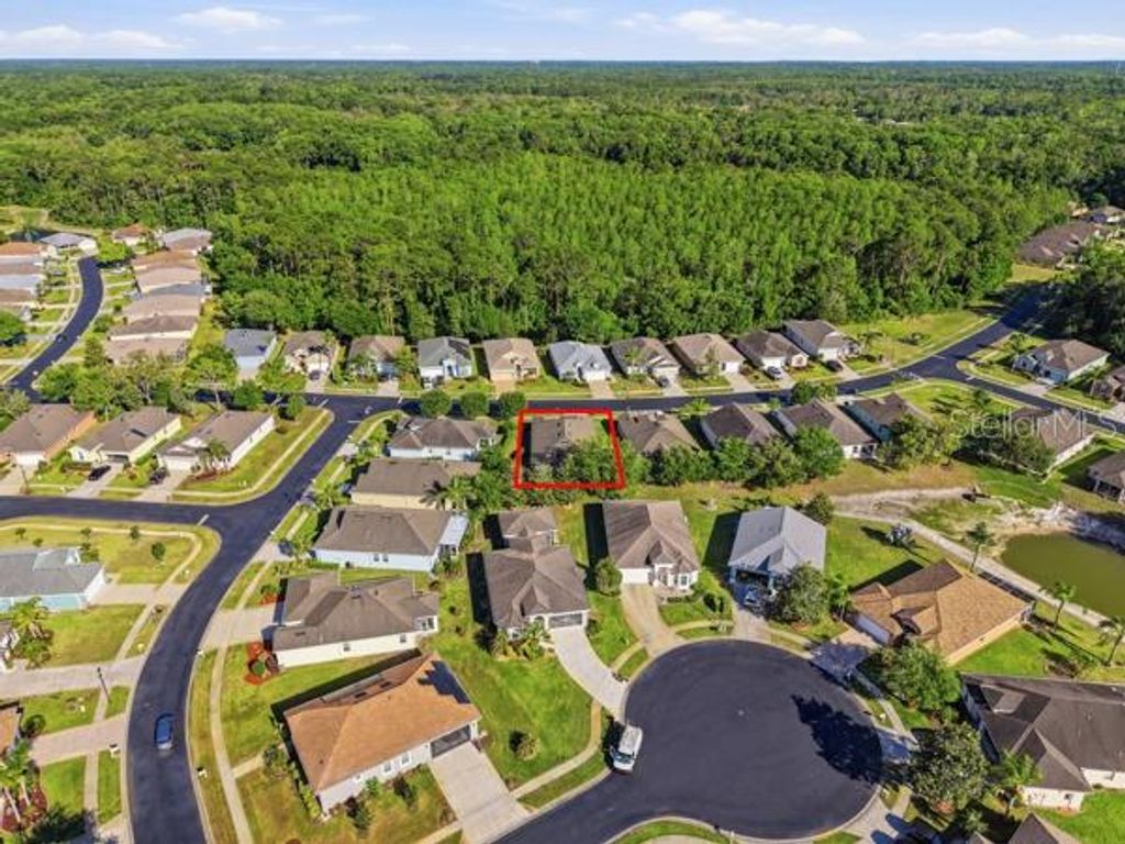 Photo of 11215 Paradise Point Way, New Port Richey, FL 34654 (MLS # TB8499305)