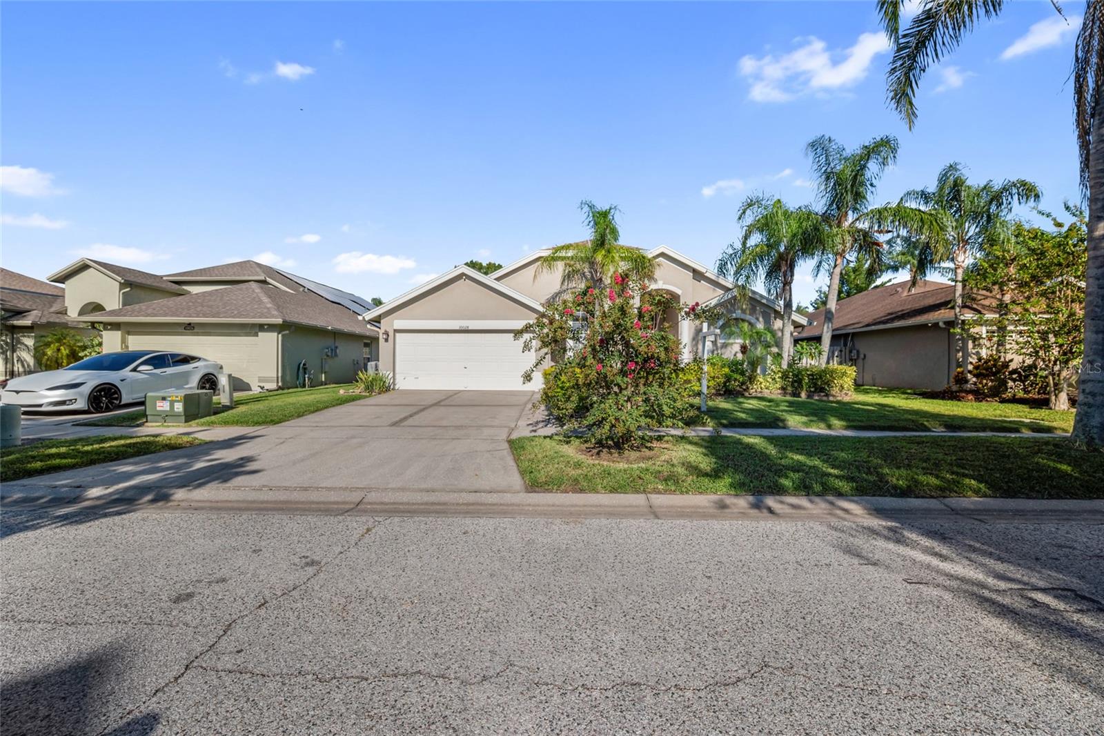 One or more photo(s) has been virtually staged. Welcome to your beautiful 4-bedroom, 2 bath home in the gated Cypress Chase community. This property features an open floor plan with spacious living and dining areas, a modern kitchen with quartz countertops and stainless steel appliances, and a large master suite with walk-in closet and ensuite bath. Additional highlights include a 2-car garage, private fenced backyard, and convenient access to shopping, dining, Veterans Expressway, and Tampa International Airport