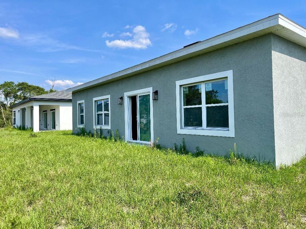 Photo of 611 Amazon Place, Kissimmee, FL 34759 (MLS # O6383623)