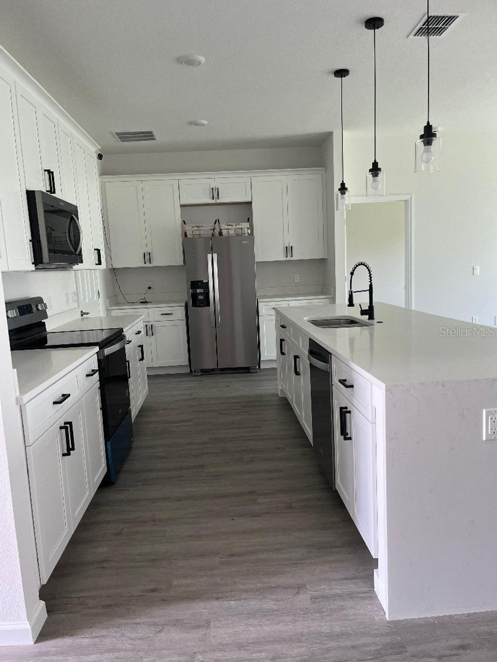 Photo of 611 Amazon Place, Kissimmee, FL 34759 (MLS # O6383623)