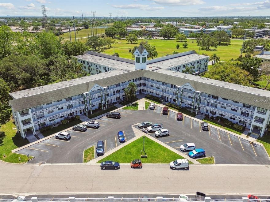 Welcome to this Charming TOP FLOOR unit! Which Eliminates any flooding issues! And No Neighbors above you. This FULLY FURNISHED 2 Bedroom/2 Bath Unit in a PET FRIENDLY building in On Top of the World, a 55+ Gated community located in the Heart of Clearwater just outside of DUNEDIN. This Desirable TOP Floor unit comes with a Reserved Parking Spot right in front on the Building. This Unit Features a Beautiful UPDATED Kitchen with Gorgeous Counter Tops and Custom Built Cabinets. Located just footsteps from the Trail and the Golf course! Featuring Luxury Custom tile throughout the living room. This unit Features Stainless Steel appliances and LED lighting. Updated Impact Windows, a Big Florida Room with great views of Courtyard that can be used as a Guest/3rd Bedroom. The Primary Bedroom features a Canopy bed for your comfort with an Ensuite Bathroom and a Newer A/C. This community has 2 Activity Centers. The amenities offered here are Amazing! This is your perfect year round living with FREE 18 & 9 hole Golf course, 4 Tennis courts, 2 Pools, One Heated, Shuffle board courts, PICKLE BALL Courts and different clubs to join within the community at NO additional cost!! Tons of activities and social events and so much more, the list of Amenities is Endless, you will never be bored living here!The remodeled Cardio Gym has the latest Exercise Equipment. A Very Pet-Friendly community, there is a fenced dog park with covered seating. There are hobby studios and a woodshop for the exclusive use of the residents. Activities include fitness classes, Dancing, clubs, Cards, Billiards, entertainment, classes, and much more. The on-site Good Karma Café has snacks and take-n-bake meals. The Rent INCLUDES almost Everything Even Your CABLE And INTERNET! Located in the heart of Clearwater, you are only Minutes away from the Nation’s Top rated Beaches. When you want to venture out, you are just 15 minutes from the beautiful sands of Clearwater Beach and 5-10 minutes from the charming village of Dunedin that has great Shopping, Dining, and Festivals and Honeymoon Island! Make an appointment today!