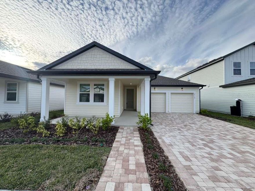 Brand new, never-lived-in home available for rent!
This beautiful residence features an open-concept floor plan with 3 bedrooms, 2 full bathrooms, and a spacious 2-car garage, offering comfort and functionality throughout.

The living area includes sliding glass doors that lead to the outdoor space with a covered lanai and open yard, perfect for relaxing or entertaining.

The gourmet kitchen is a standout, complete with 42-inch cabinetry, stainless steel appliances, a large center island, and high-quality quartz countertops. This home seamlessly blends timeless design with thoughtfully selected finishes.

Located in the desirable Trailside community, residents enjoy access to community pool, clubhouse, playground, and walking sidewalks, all while being conveniently close to top-rated schools and charming local shops and restaurants.

Don’t miss the opportunity to lease this modern, move-in-ready home in a fantastic community!