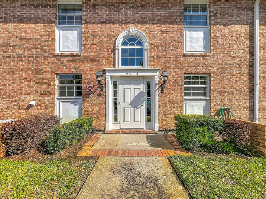 Welcome Home! This beautiful 2-bedroom, 1-bathroom condo located in the desirable Plantation Gardens community is nestled in a serene, beautifully landscaped community and offers the perfect blend of comfort and style. Upon entering the home, you are greeted with an open concept floor plan. You will immediately notice the stunning Travertine Tile flooring throughout including the bathroom and bedrooms along with the white plantation shutters on every window including the patio sliding door. The fully equipped kitchen offers stainless steel appliances, granite countertops, granite back-splash, granite cabinet top and bottom trim, under-cabinet lighting, built-in wine rack and ample cabinet space. The large spacious bathroom boasts a jetted tub/shower combo with glass shower enclosure, toilet AND stand-alone bidet, vanity with granite counter-top and a linen closet with lots of storage space. The primary bedroom has large walk-in closet with large washer and dryer and folding table with plenty of space for clothing. The guest bedroom comes with built-in Murphy Bed that allows for additional space when not in use. The living area leads out to the screened-in patio area complete with storage closet and a shared stair-case leading down to the beautiful green courtyard and garden area. The HOA covers a HOST OF VALUABLE UTILITIES AND SERVICES, including water, basic cable, internet, valet garbage, sewer, and MOST NOTABLY, an energy-efficient AC/heating unit powered by a cost-saving chiller system—helping you maintain optimal comfort without breaking the bank. Residents of Plantation Garden Condos enjoy an impressive array of resort-style amenities, including: Two large swimming pools, well-equipped fitness center, tennis, pickle ball and basketball courts, car wash station, dog park, laundry room (though you have a laundry closet in your home), a dock and kayaking rack right on beautiful Lake Giles, and a reservable clubhouse which even has 2 saunas (men's and women's) for a luxurious, spa-like experience. Scenic Lake Underhill is right across the street and comes complete with walking trail, and picnic area—perfect for outdoor activities and weekend relaxation. This move-in ready condo is a rare find in a prime location—what's holding you back? Schedule your showing today and make it yours!