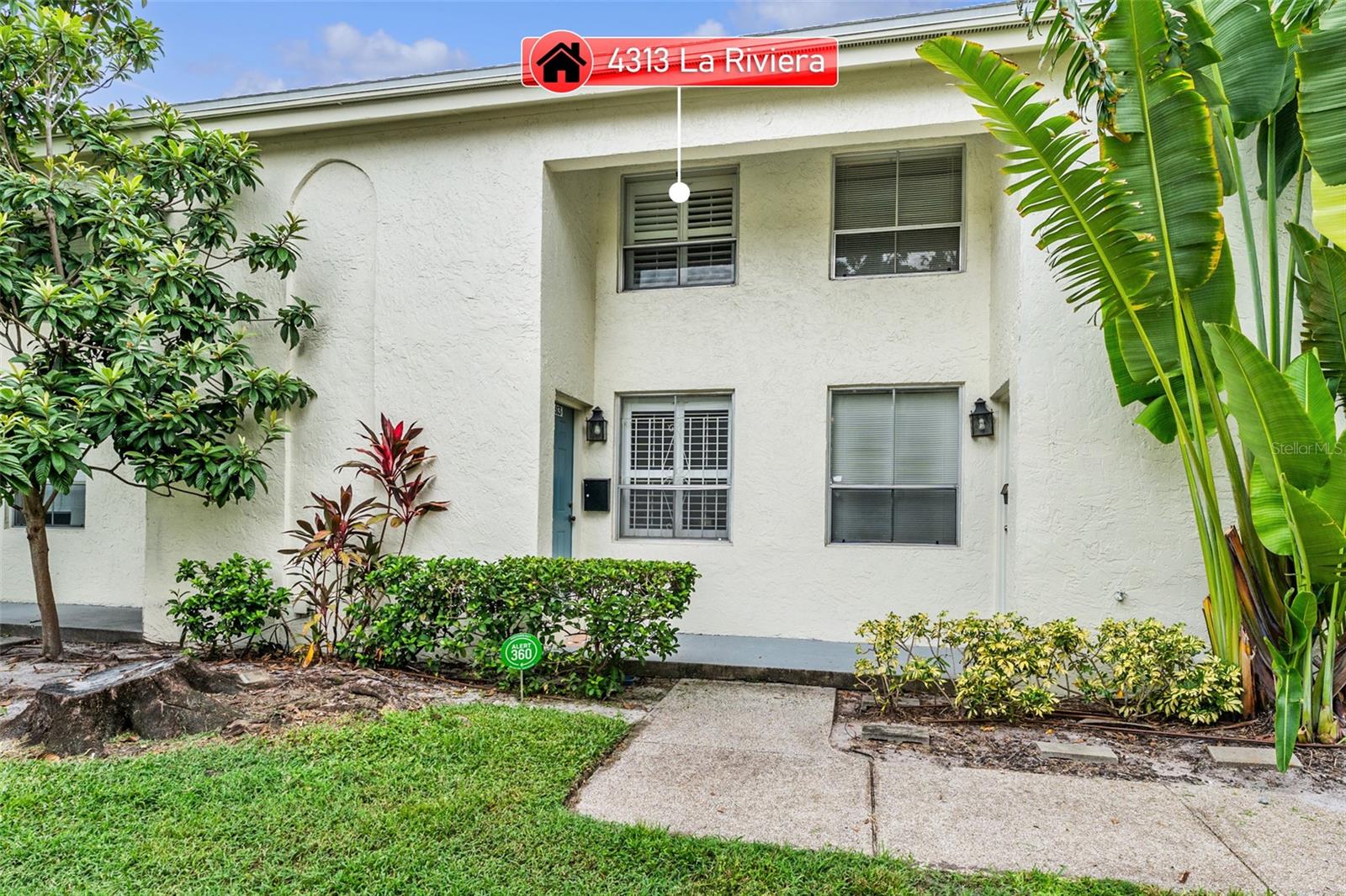 Nestled in the tropical, park-like embrace of Tampa Villas South, this beautifully updated 2-bedroom, 1.5-bathroom townhome offers 1,044 sq ft of move-in-ready South Tampa charm at an unbeatable price. Just five minutes from Gandy Commons, with its Publix plaza, Starbucks, and endless dining and shopping, this multi-level home sits in an A+ rated school district, perfect for families or savvy investors. Its prime location ensures quick commutes to downtown Tampa, St. Pete, Tampa International Airport, and MacDill Air Force Base, all wrapped in a lush, garden-inspired neighborhood that feels like a hidden oasis. With low HOA fees of $185 per month this townhome is a rare find in a tropical, vibrant setting. Step into a freshly painted interior, where brand-new carpets and a neutral palette create a warm, inviting canvas ready for your personal touch. The main floor welcomes you with a modern kitchen featuring crisp white cabinets, flowing seamlessly into a private, gated brick courtyard—ideal for sipping morning coffee or unwinding with an evening drink and a good book. Ascend to the second floor, where the living room steals the show with its soaring vaulted ceilings, fresh paint, and an abundance of natural sunlight pouring through large windows, filling the space with a glowing, loving energy that makes it the heart of the home. Adjacent to this super-bright living room, a convenient half-bathroom serves you and your guests with ease. Climb to the third floor to find a cozy guest bedroom, bathed in light and complemented by new carpeting and tall ceilings, alongside a cute, functional full bathroom and a spacious hallway closet for ample storage. The top floor reveals the owner’s suite, a light-filled retreat with vaulted ceilings that practically glows with natural sunlight, offering a serene escape for its next owners. This home, situated in Flood Zone X with no flood insurance required, boasts a new roof, recent updates, and a professional cleaning, ensuring it’s ready to welcome you from day one. The Tampa Villas South community enhances your lifestyle with a pool, playground, basketball court, and tennis court, all set against a backdrop of lush landscaping that evokes a tropical paradise. With one reserved parking spot and plenty of visitor parking nearby, convenience is at your fingertips. Just minutes from the Crosstown Expressway and Gandy Bridge, this townhome offers easy access to South Tampa’s best, without the millionaire price tag. Fresh, clean, and brimming with value, this lovingly maintained home is a hidden gem ready for its next chapter!
