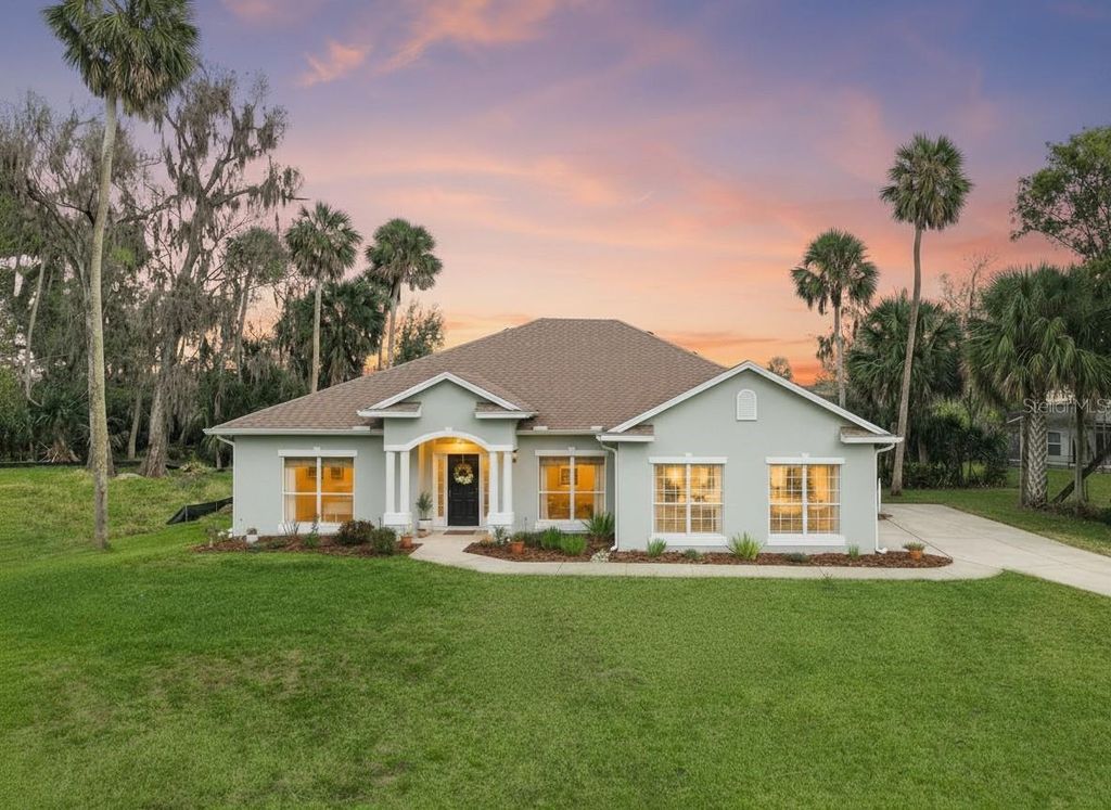 Photo of 16805 Beauclaire Court, Tavares, FL 32778 (MLS # O6394234)