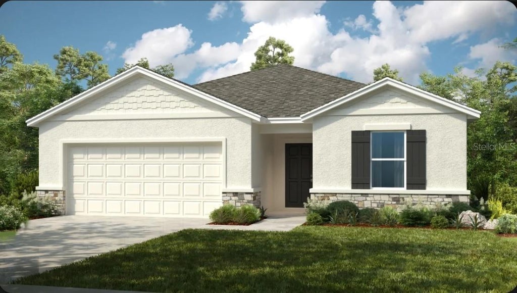 Photo of 7409 Fieldstone Drive, Groveland, FL 34736 (MLS # O6438173)