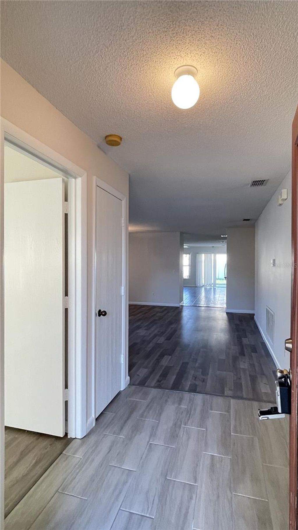 Photo of 1365 Epson Oaks Way, Orlando, FL 32837 (MLS # O6372613)