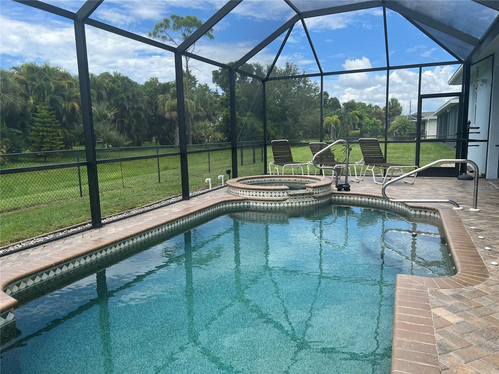 Photo of 11 Broadmoor Lane, Rotonda West, FL 33947 (MLS # D6148501)
