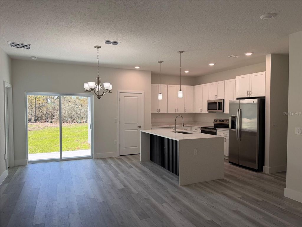 Photo of 22930 SW Kearny Lane, Dunnellon, FL 34431 (MLS # O6392304)