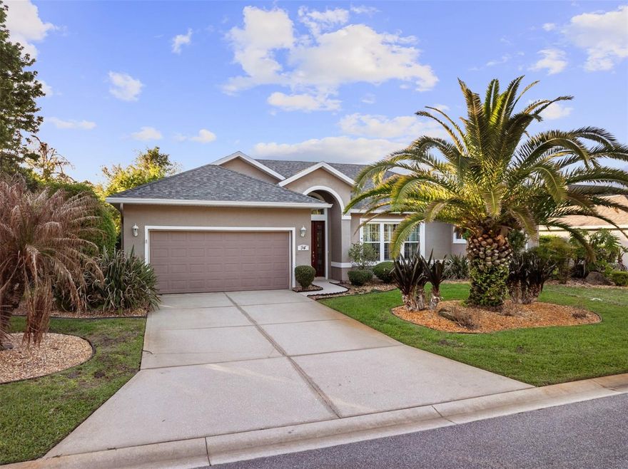 Beautifully maintained and move-in ready, this 3-bedroom, 2-bath Tiffany model by ICI Homes offers the perfect blend of comfort, upgrades, and serene lakefront living in sought-after Plantation Bay Community in Ormond Beach.
Step inside to a welcoming foyer with elegant architectural pillars that frame a desirable split floor plan, providing privacy between the spacious primary suite and guest bedrooms. The home features tile flooring throughout the main living areas and newer carpet in all three bedrooms. Multiple living spaces include a formal dining room, a generous living room, and a cozy family room highlighted by a fireplace—ideal for both relaxing and entertaining.
The updated kitchen is designed to impress, featuring new cabinetry, granite countertops, and newer appliances, along with a bright breakfast nook overlooking the outdoor living space. Sliding glass doors from the primary suite and breakfast area lead to a large covered lanai.
Enjoy true Florida living outdoors with a screened-in, heated pool and spa overlooking a tranquil lake—perfect for year-round enjoyment and entertaining. The beautifully landscaped lot adds to the home’s curb appeal and peaceful setting.
Recent updates include a new roof (2023), appliances (2023), HVAC (2020), hot water heater (2024), and windows replaced in 2018. Additional features include a portable generator, gutters, a laundry room with utility sink, and window treatments throughout, including plantation shutters on the front windows, pull down privacy shade screen on lanai.  A buried propane tank (rented at approximately $80/year) adds convenience and efficiency.
Existing furniture is included, making this a truly turnkey opportunity.
This home is situated in the highly desirable golf-cart-friendly community of Plantation Bay, where lifestyle truly shines. Optional country club membership offers 45 holes of private golf, a brand-new $30 million clubhouse, tennis and pickleball courts, resort-style pools, fitness center, spa, and more.
Bonus: Buyer receives a discounted country club initiation fee – ask for details!