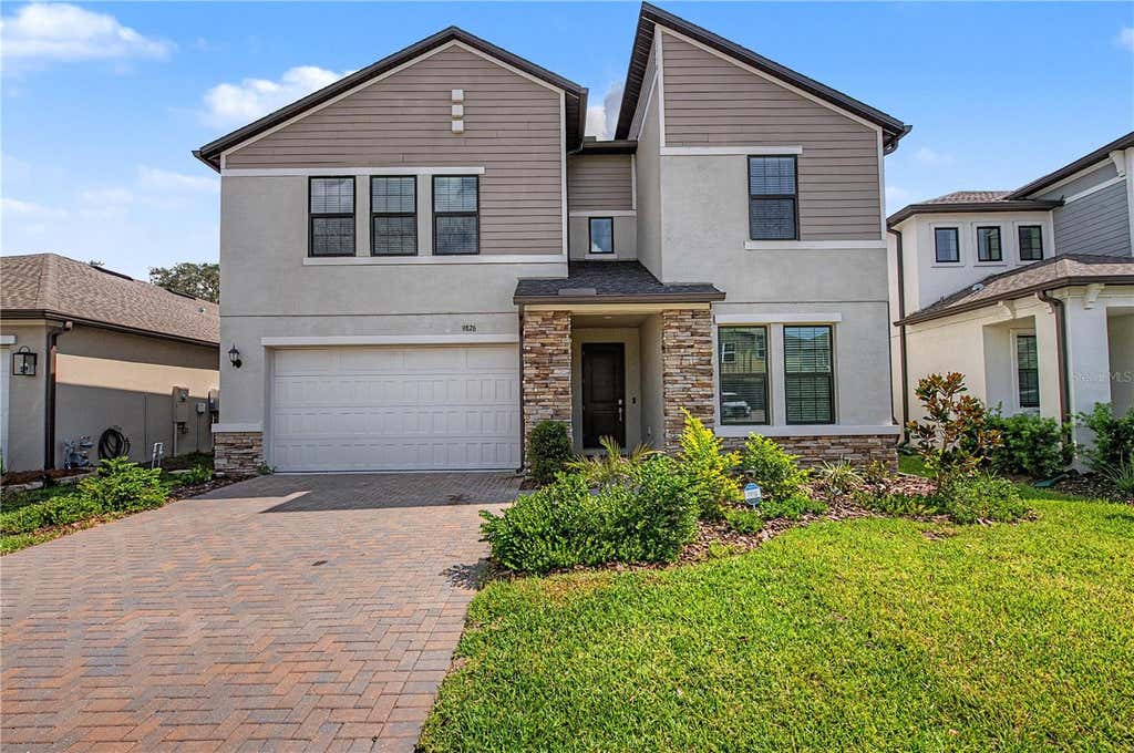 Photo of 9826 Carabiner Way, Land O Lakes, FL 34637 (MLS # TB8538573)