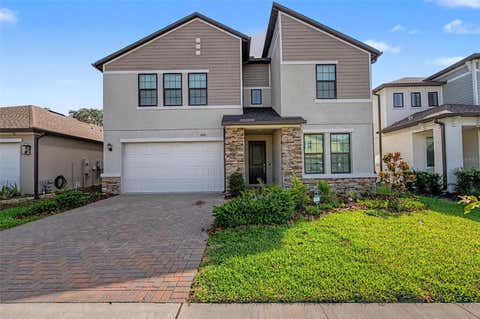 Photo of 9826 Carabiner Way, Land O Lakes, FL 34637 (MLS # TB8538573)