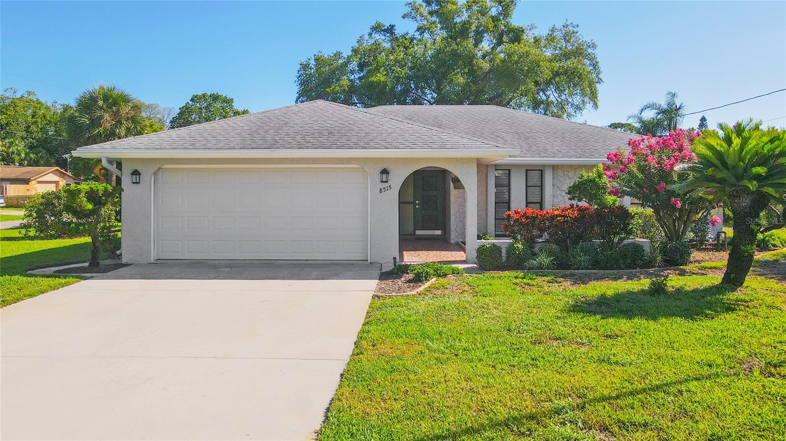 One or more photo(s) has been virtually staged. This beautiful home in Hudson's Sea Pines community has been remodeled from A to Z with high-end finishes. The true turnkey house with 3 bedrooms and 2 bathrooms offers an open-concept layout that combines comfort and style. The extensive renovation was completed under the General Contractor permit and licensed subcontractors. Each phase of construction had multiple inspections from the county for peace of mind for the new owner. The house has been remodeled up to the current Florida codes, including re-wiring. A beautiful living room with a charming fireplace is perfect for creating unforgettable moments. The spacious kitchen with double pantry features brand-new real wood shaker cabinetry, granite countertops, and stainless-steel appliances that any chef will love. The water heater, all kitchen and laundry appliances are brand new. The master bedroom is very spacious. Relax on the large screened-in porch. Sea Pines is the Hudson’s pearl of a neighborhood that offers a relaxed lifestyle with nearby beaches, marinas, and restaurants. The distance to Hudson Beach is less than 4 miles. Don't miss this opportunity! This is your moment to live and enjoy your dream!
