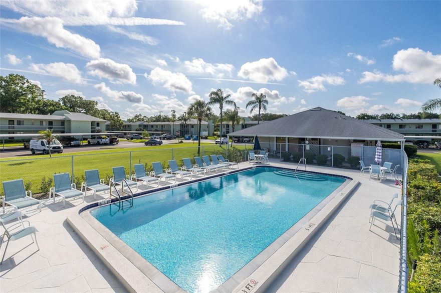 "RESORT STYLE LIVING" in East Lake Woodlands!  This beautifully maintained 2-bedroom,2-bath condominium offers approximately 1,151 sq ft of comfortable living space in one of Oldsmar’s most desirable gated communities. Major updates provide peace of mind, including flooring, A/C system, hot water heater, dishwasher, washer and dryer, and bedroom carpeting all approximately 3 years old, plus a refrigerator replaced in 2025. The open living and dining areas create an inviting space for entertaining, Move-in ready, thoughtfully designed and updated this home features a spacious layout, abundant natural light, and a screened lanai—perfect for enjoying Florida’s year-round lifestyle. Enjoy the convenience of covered parking and maintenance-free living. Residents enjoy access to a community pool, pool club house, beautifully maintained grounds, and optional country club amenities including golf, tennis, fitness, and social activities. Ideally located near shopping, dining, parks, beaches, Tampa International Airport, and top Pinellas destinations, this condo offers the perfect blend of convenience, value, and resort-style living. Whether you’re looking for a full-time residence, seasonal retreat, or investment opportunity, this East Lake Woodlands gem is one you won’t want to miss!