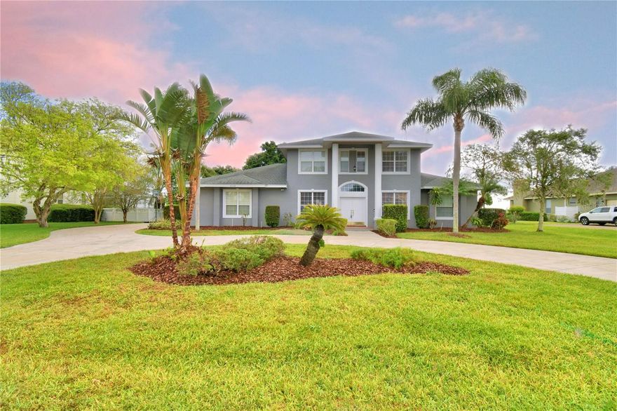 This beautiful home overlooks Lake Hamilton being the largest lake on a chain of three, Lake Hamilton, Middle Lake Hamilton, and Little Lake Hamilton in Winter Haven Florida making Hamilton Pointe a sought out community. The 2 story home presents with a circular drive way leading to the double front door entrance. Upon entering 3161 Square feet of living area, high ceilings with crown molding, 5 bedrooms, 3 bathrooms, and a stunning view of the lake. The foyer has marble tile with the dominant flooring down stairs being wood. On the left the formal dining room is currently being used as an office and on the right side of the foyer is the formal living room. The family room offers welcoming view of the lake which flows into the bonus room. The kitchen has granite countertops, pantry, breakfast bar along with a large dinette with a view of the lake. The Laundry room is on the first floor. The large primary bedroom faces the lake includes a master bath with a garden tub, shower, dual sinks, and a spacious walk in closet. On the second floor there are 3 bedrooms and one bathroom. The side drive way leads to the large attached garage. Inground Irrigation. There is an attached screened lanai with a lake view to enjoy the sunrise. Winter Haven is also known as " The Chain of Lakes City" comprised of 19 interconnected lakes. Great for boating, skiing, and fishing. Winter Haven is conveniently located between Orlando, Tampa, and a growing airport in Lakeland. Legoland is 20 minutes away and Disney World is approximately 45 minutes away. For the Arts, Winter haven has Theatre Winter Haven offering plays and music. Historic Ritz Theatre is now Ritz Reimagined offering bands performing music of the past. Great restaurants and shopping. All room measurements are approximate and should be verified by the buyer.