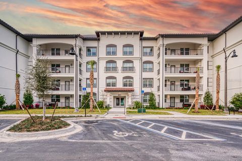 Photo of 4013 Breakview Drive #A407, Orlando, FL 32819 (MLS # O6310014)