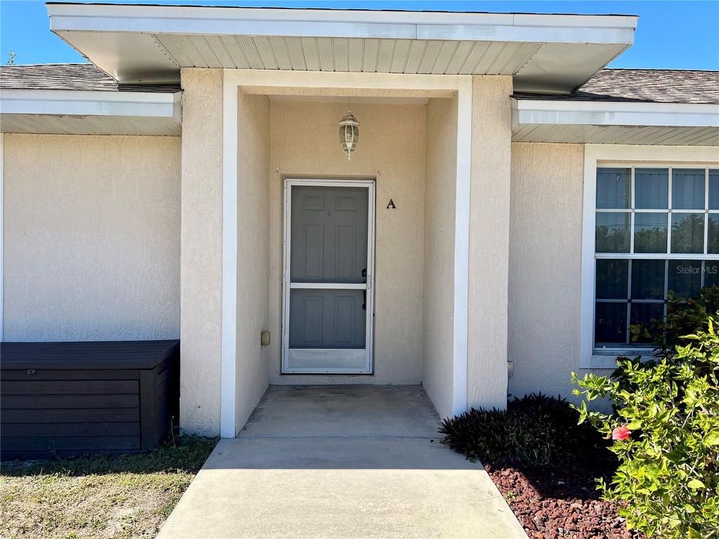 Photo of 6795 David Boulevard #A, Port Charlotte, FL 33981 (MLS # O6386211)